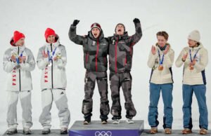 Austria memenangkan emas dalam lompat ski tim super putra Olimpiade pertama karena acara dipersingkat karena cuaca