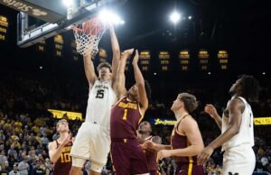Bola basket Michigan peringkat ketiga meraih bagian kejuaraan Sepuluh Besar dengan kemenangan atas Minnesota