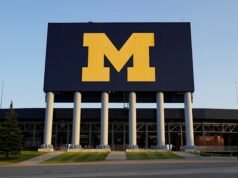 Mantan pelatih gelandang Michigan Chris Partridge menggugat universitas atas pemecatan