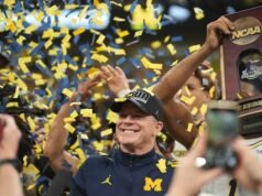 Pelatih kepala Dusty May mendekati tonggak sejarah saat bola basket Michigan menuju Final Four di Indy
