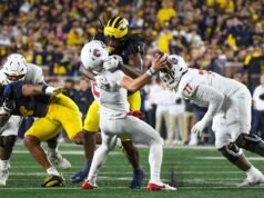 Dallas Cowboys memilih gelandang sepak bola Michigan Jaishawn Barham dengan pilihan No. 92 dalam draft NFL